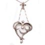 14 Karat Yellow white Gold Victorian Diamond Heart shaped pendant and .835 silver chain