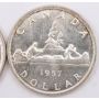 1957 one water line plus 1957 regular Canada silver dollars Choice UNC