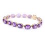 14 Karat Yellow Gold Ladies Amethyst Tennis bracelet  6 1/2 inches