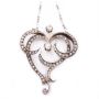 14 Karat Yellow white Gold Victorian Diamond Heart shaped pendant and .835 silver chain