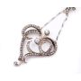 14 Karat Yellow white Gold Victorian Diamond Heart shaped pendant and .835 silver chain