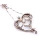 14 Karat Yellow white Gold Victorian Diamond Heart shaped pendant and .835 silver chain