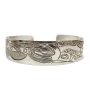 Northwest Coast carved silver bracelet Whale chasing Salmon 